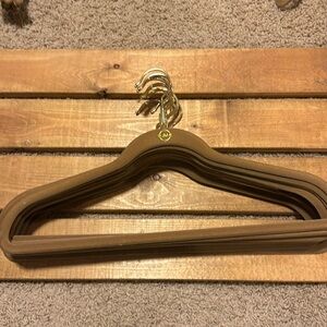 Joy Mangano s/12 dark beige flecked suit hangers. Brass colored hardware.